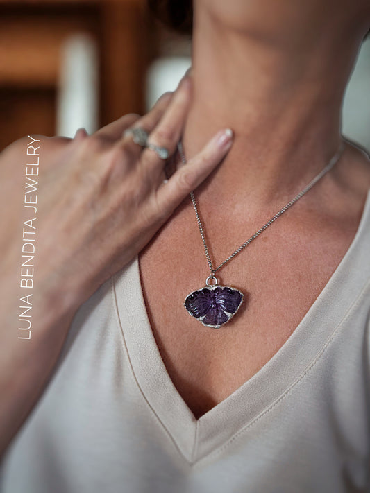 Carved amethyst butterfly pendant