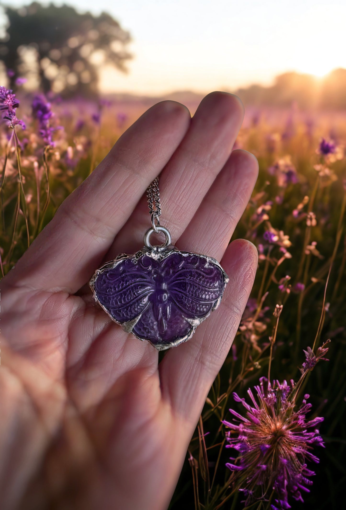 Carved amethyst butterfly pendant