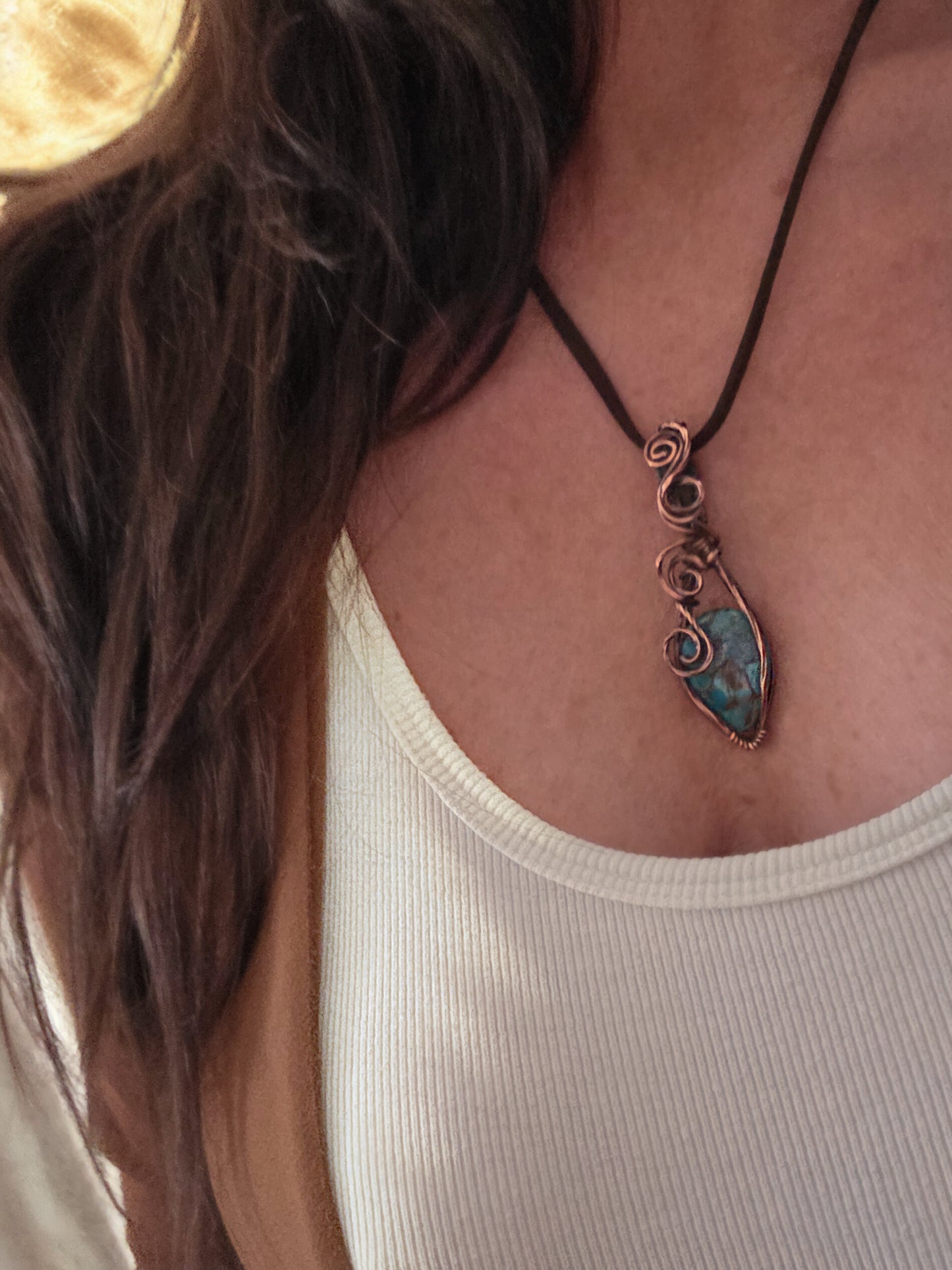 Handcrafted genuine Turquoise/ copper wire wrapped pendant.