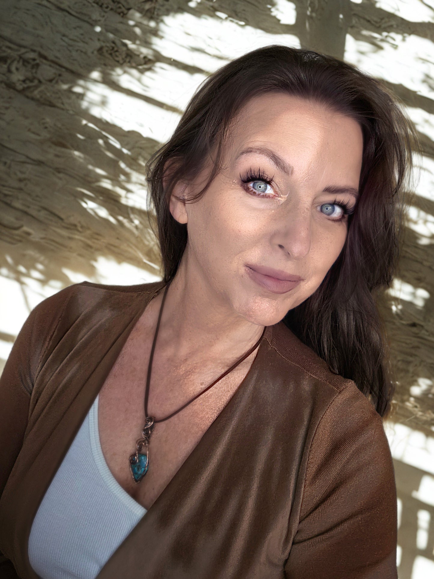 Handcrafted genuine Turquoise/ copper wire wrapped pendant.