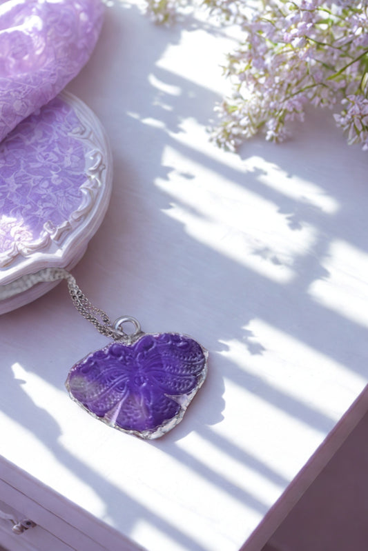 Carved amethyst butterfly pendant